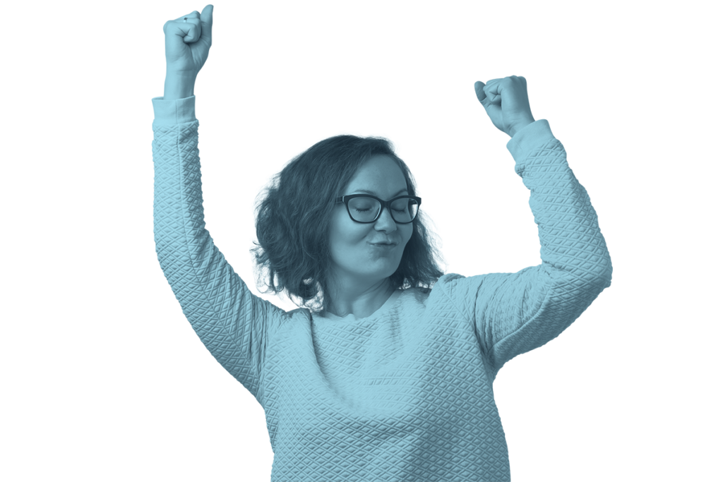 a woman in a white sweater and black framed glasses dancing with her arms in the air.